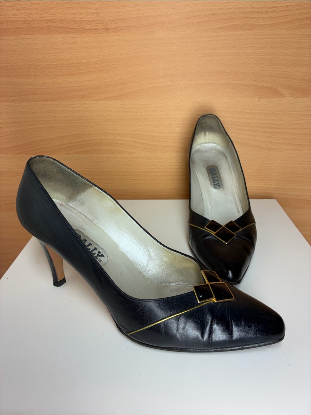Bally Women’s Black Leather Pointed-Toe Heels with Gold Trim Accents, size 8